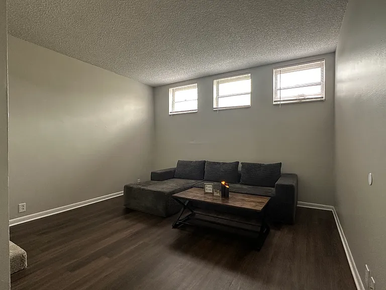 807 Living room Freshly painted, new plank floor, natural sun light through windows.