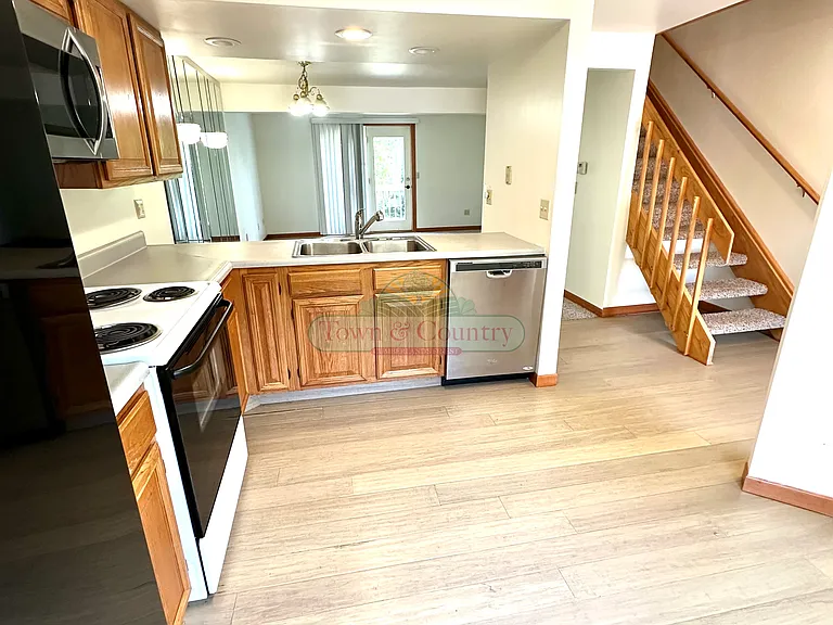 10690 Rose Briar Ct NE #125 — Photo 1