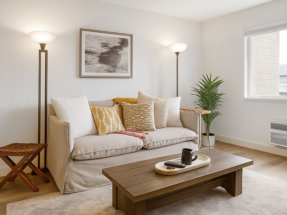 Sink into comfort in this cozy corner, perfect for relaxing with a book or morning coffee.