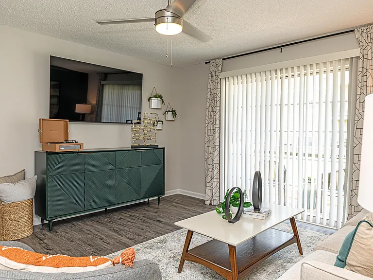Spacious living room with hardwood-style flooring