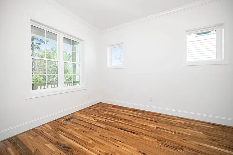 Downstairs Bedroom/Office flex space, loaded with windows