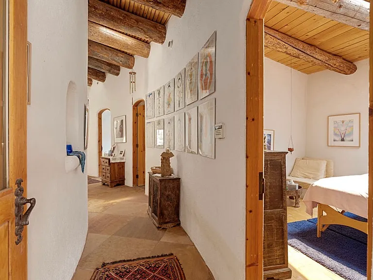 Corridor leading to 3 treatment rooms / bedrooms