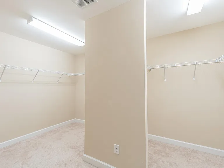large master closet with his and hers space