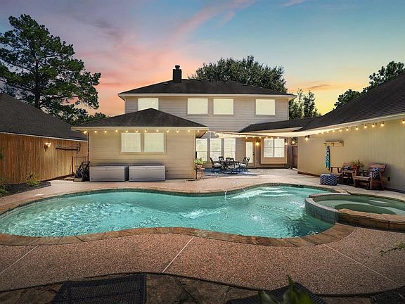 Here is a beautiful glimpse at twilight of your future backyard complete w/ pool & spa!