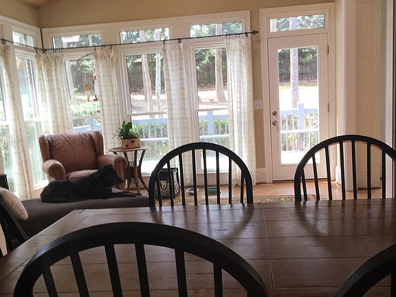 View of sunroom from kitchen