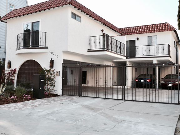 Front of building with second balcony for unit #3 on the lef
