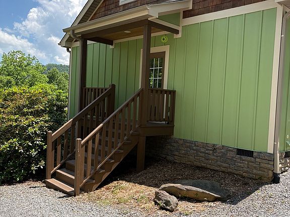 Side Entry door with covered porch.