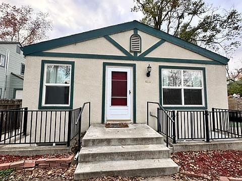 Front of house with a private gated entrance.