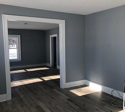 View of downstairs dining room and family room