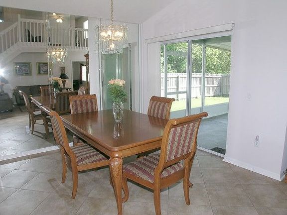 Formal dining room with sliders to lanai
