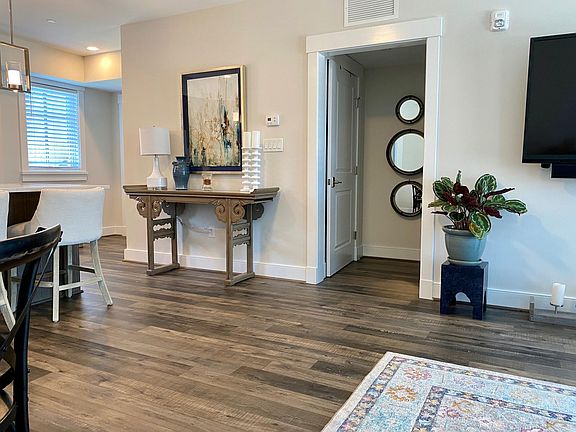 Alcove: utility closet door shown, powder room is opposite utility closet.
