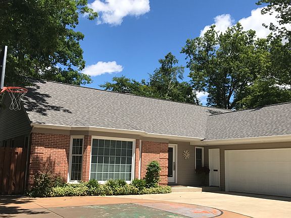 Front of Home, Basketball Court, 2 Car Garage