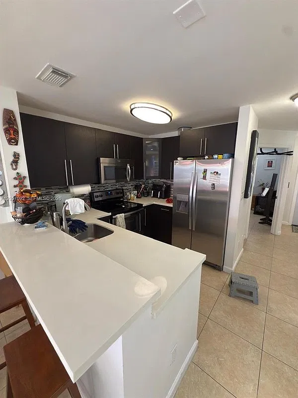 13909 SW 172nd Ln #13909 — Photo 2