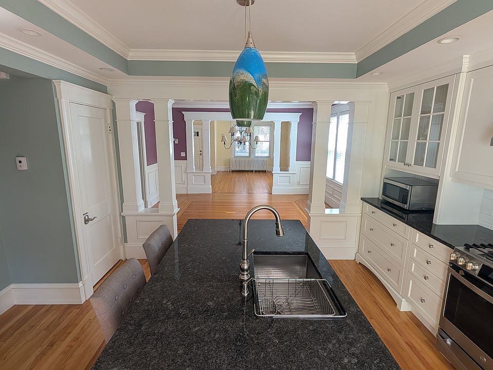 View of dining room and living room from kitchen