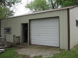 209 N 1st St, Deepwater, MO 64740