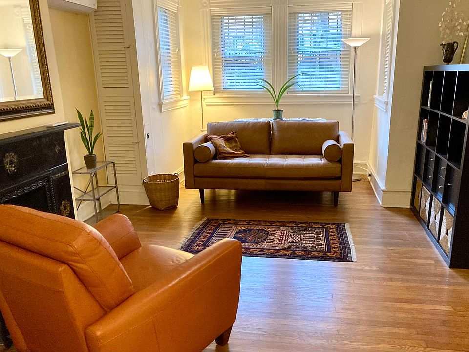 Front living room with brand new couch and chair.