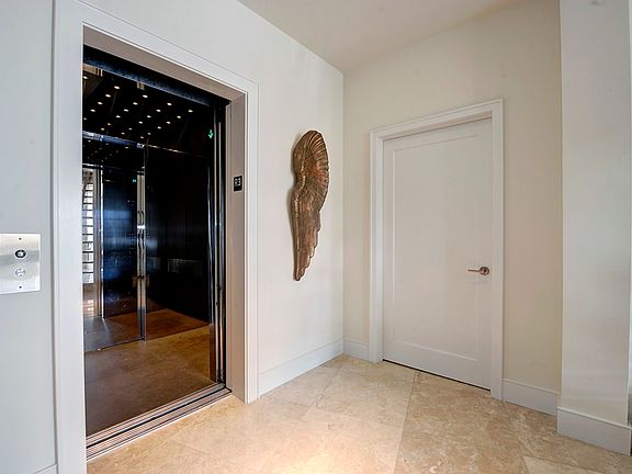 Privately Keyed Elevator Opens Into Your Residence