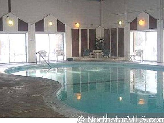 Pristine year 'round pool with hot-tub, sun deck & party room.