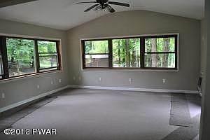 Living room with vaulted ceiling