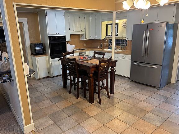 Kitchen & dining. Tile floor