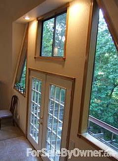 One of two sets french doors upper dome
						:
						Woodsy view of bird, deer and other wildlife from comfort of private Great Room