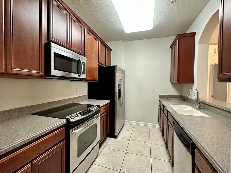 3338 Robert Trent Jones Dr #1-210 — Photo 5