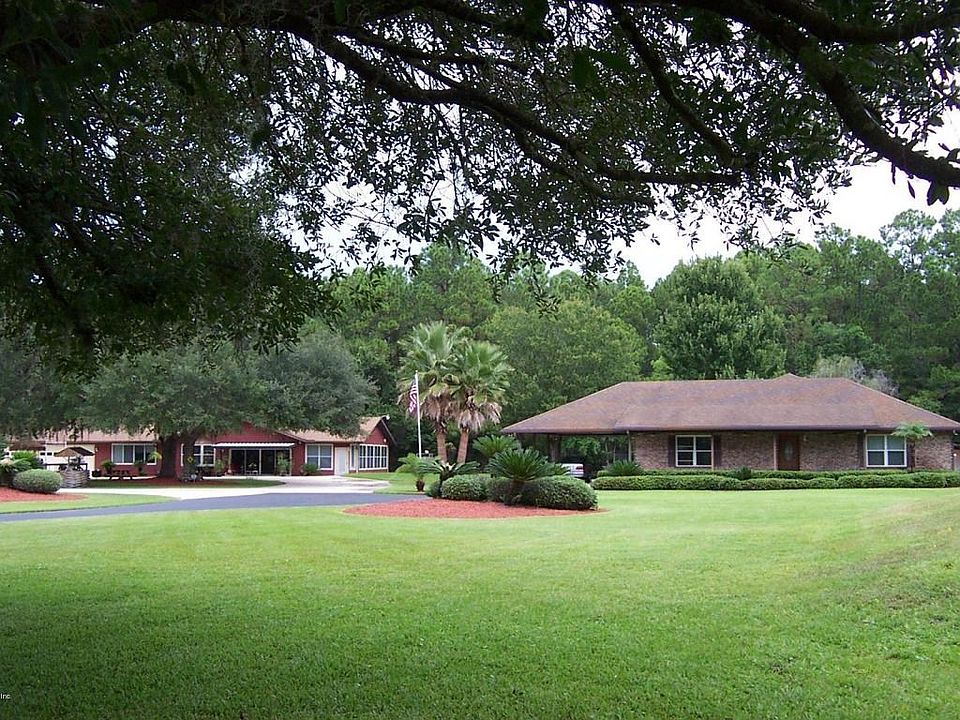 S1-Brick Home with Red Guest House
