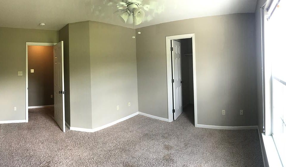 Second bedroom upstairs with walk in closet.