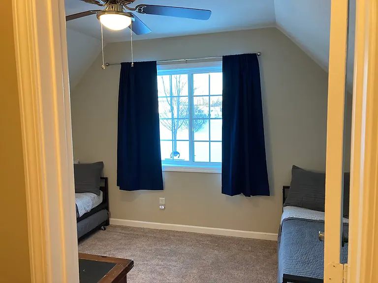 Bedroom 2. home does not come furnished. furnishing is for visual reference only.