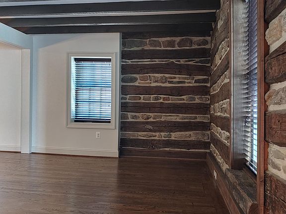 Living Room with Hardwood Flooring throughout