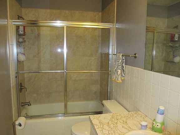 Full bathroom on main level with updated shower.