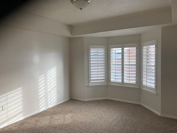 guest bedroom with walk in closet