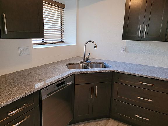 Brand new kitchen including sink, faucet, cabinets and countertops. All new stainless steel appliances