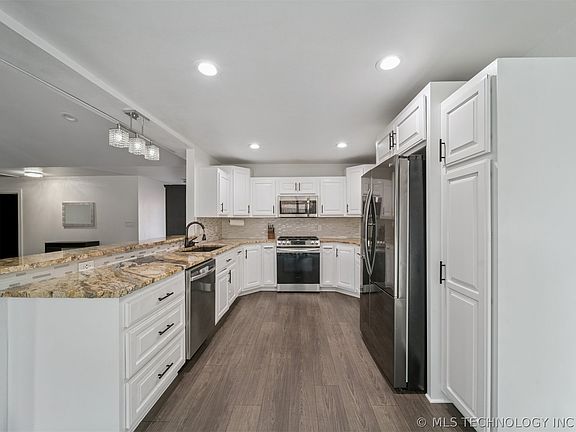 5th image of 7705 N 127th East Ave