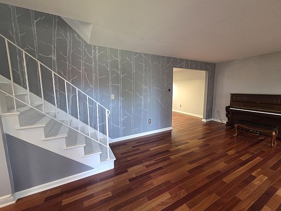 Reception room stairs to 1st floor through to kitchen