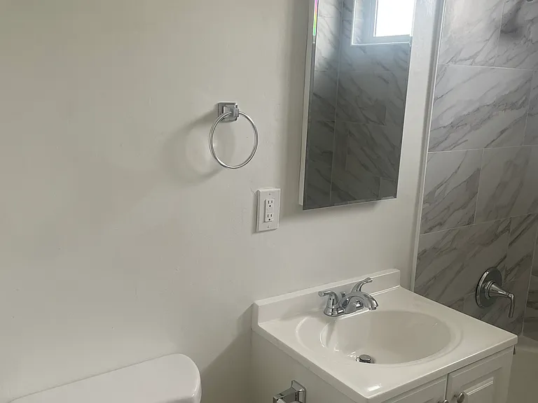 bathroom toilet and vanity