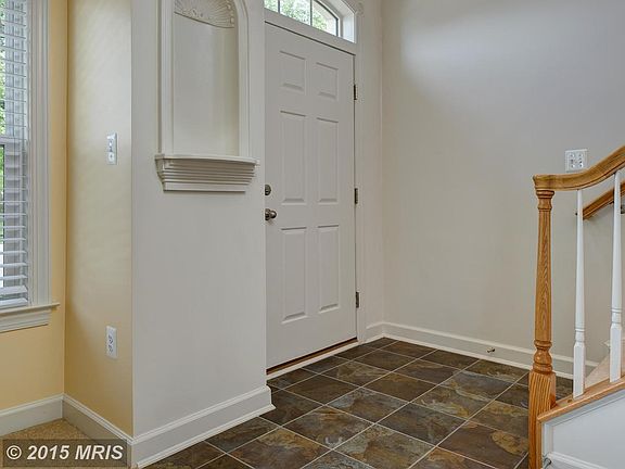 Ceramic Tile 2 Story Foyer
