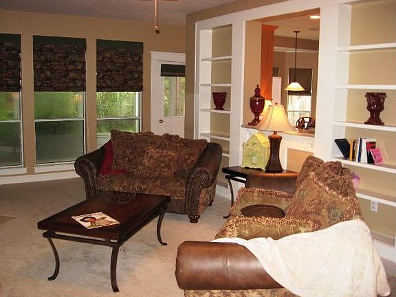 Living Room with Fireplace and Built Ins Galore