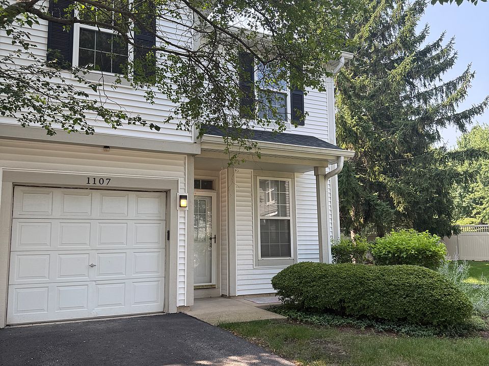 Front entry; attached garage; yard maintained by HOA