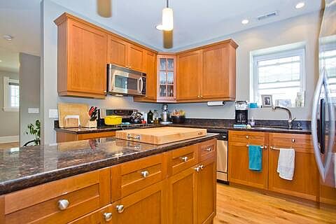 Open kitchen - cabinets have been painted since this photo
