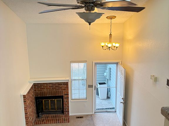 Bright and Cheery Living Room with Fireplace