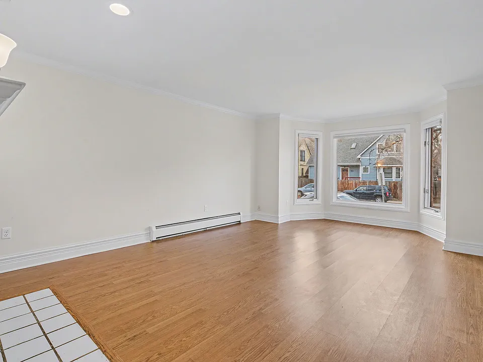 Living room with large bay windows