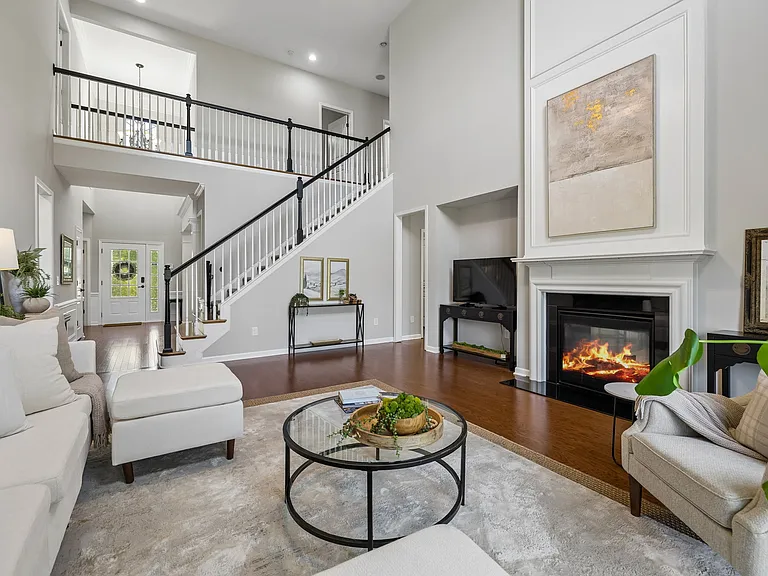 One of the home's most impressive features is its connectivity-combining soaring ceilings, open sightlines, and thoughtfully integrated living spaces that create a natural flow for both entertaining and everyday living