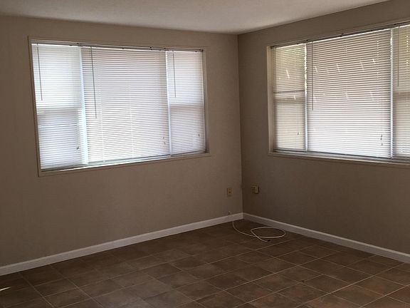 Large open living room with tons of natural light