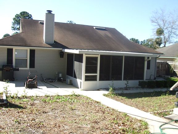 Back of home w/ Florida Room