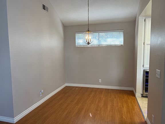 Dining room with vaulted ceilings.