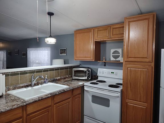 4th image of 13582 E Highway 40 Lot 140