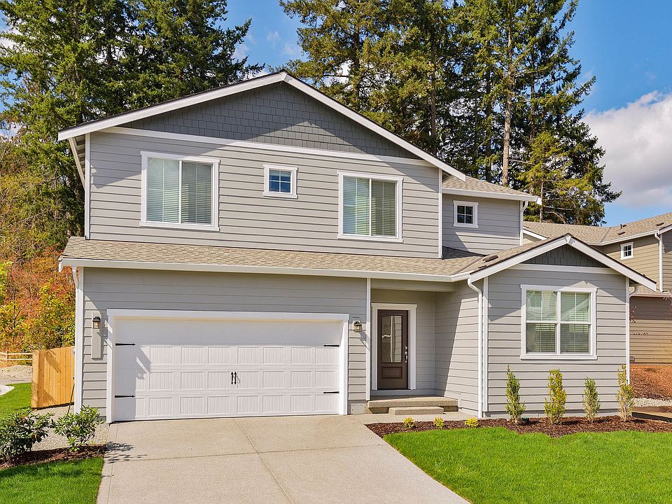 The Henry is a beautiful two story home with siding.