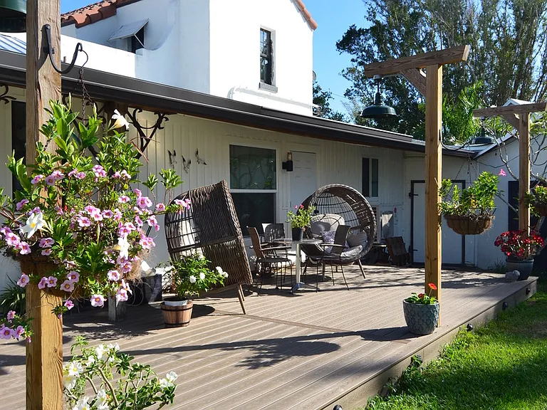 Covered porch and deck area. Loads of space to relax or entertain.
