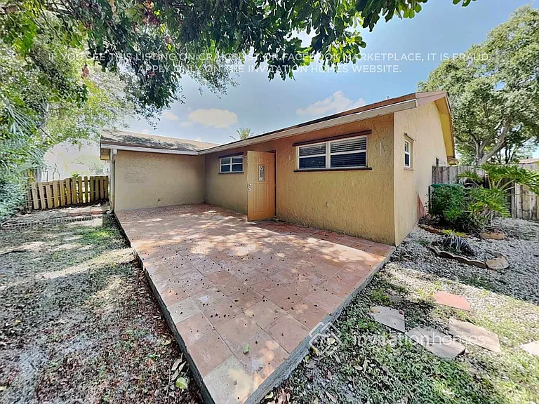 9575 NW 25th Ct — Photo 17